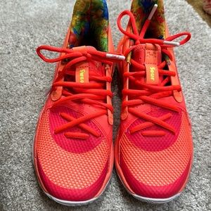 Under armour pink peach sour patch curry 4.5 great condition. New with out box